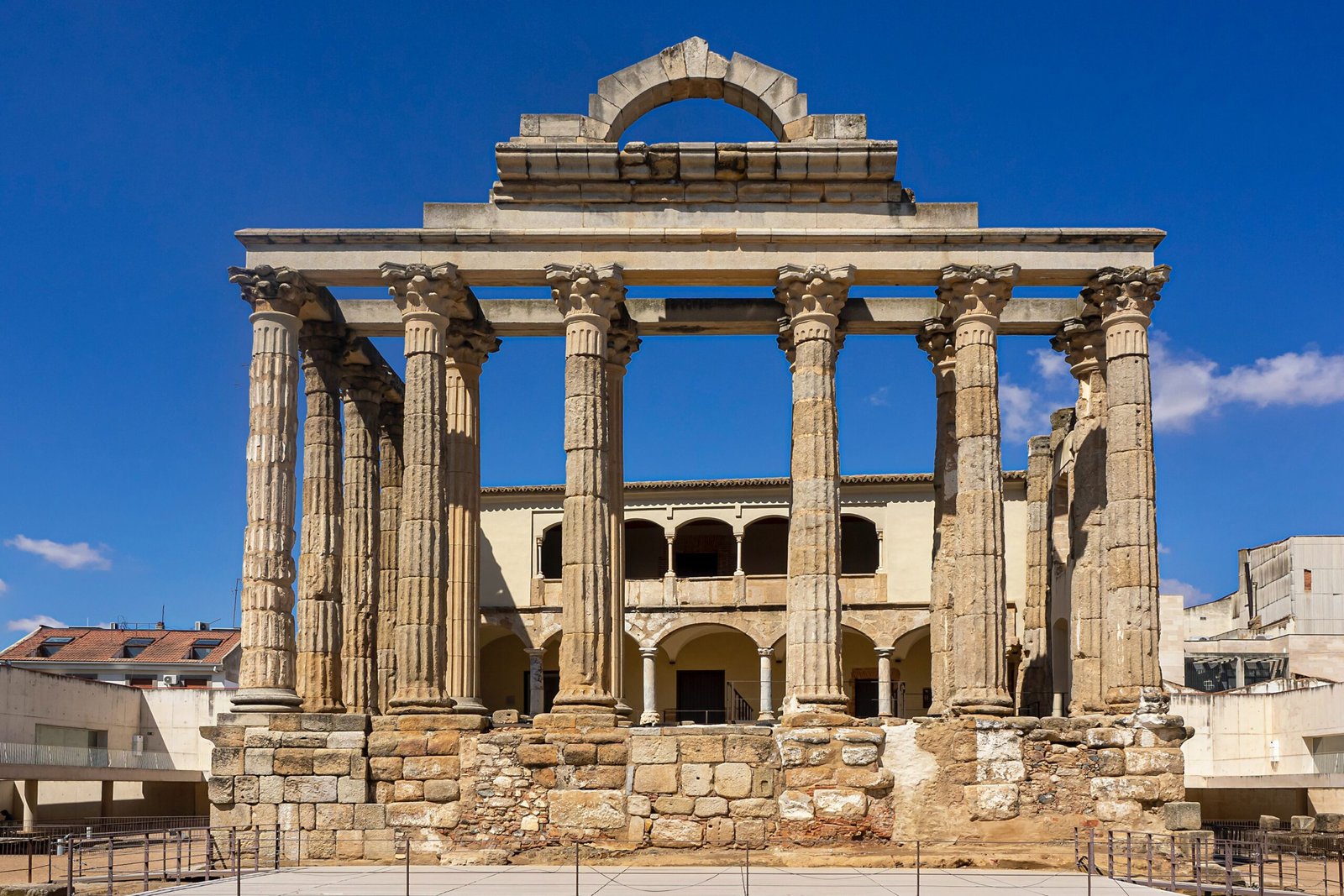 a large stone building with columns and arches